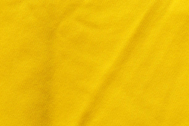 istock Yellow color fabric cloth polyester texture and textile background. 1401644334