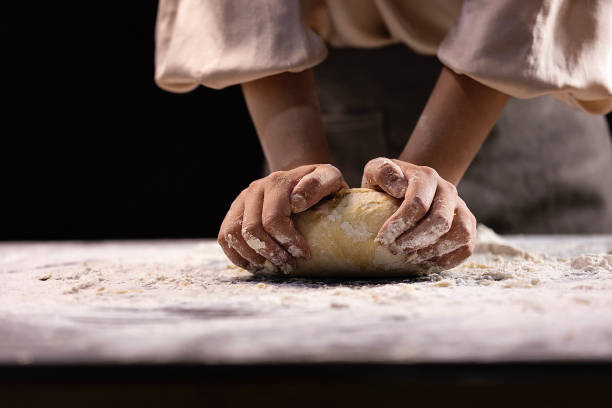 Kneading dough, the traditional Chinese pasta wheaten food making process - stock photo stock photo