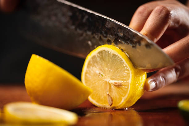 istock Sliced lemon, cool and fruity cold drink making process - stock photo 1401646418