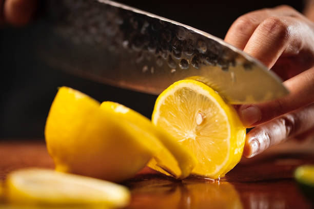 istock Sliced lemon, cool and fruity cold drink making process - stock photo 1401646420