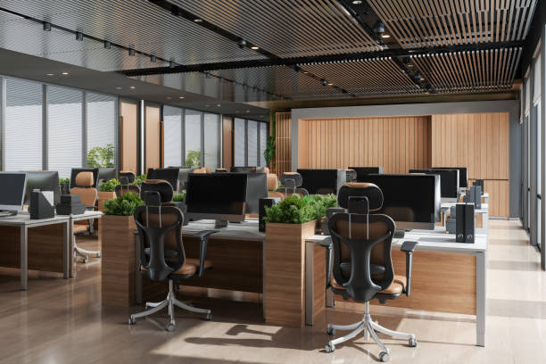 istock Interior Of A Modern Open Plan Office With Desks, Computers, Office Chairs And Plants 1401655616