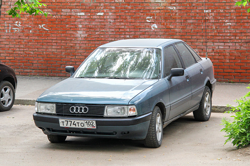 Ufa, Russia - May 21, 2012: Old German car Audi 80 in a city street.