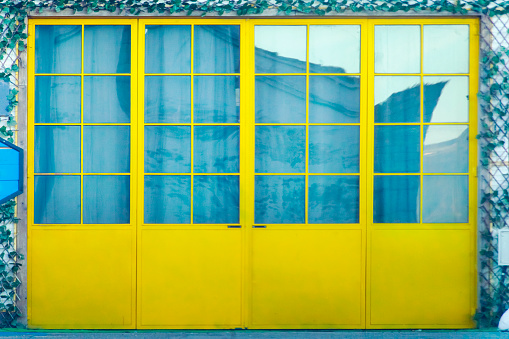 Yellow door. Sada , A Coruna province, Rías Altas, Galicia, Spain.