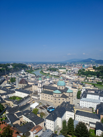 Salzburg, Austria - August 26, 2019: View of the architecture of the city of Salzburg and the river from the Hohensalzburg Fortress. Copy space.