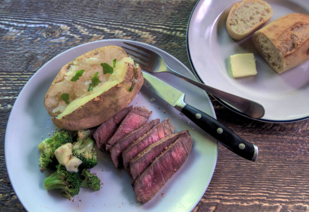 istock Top View London Broil Dinner on natural wood Surface 1401659649