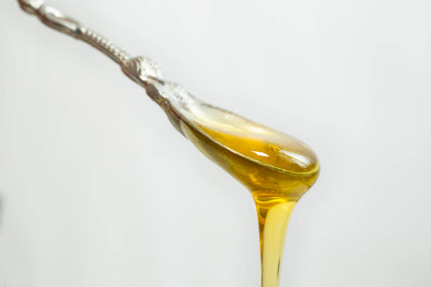 istock silver teaspoon full of honey
isolated on white 1401662060