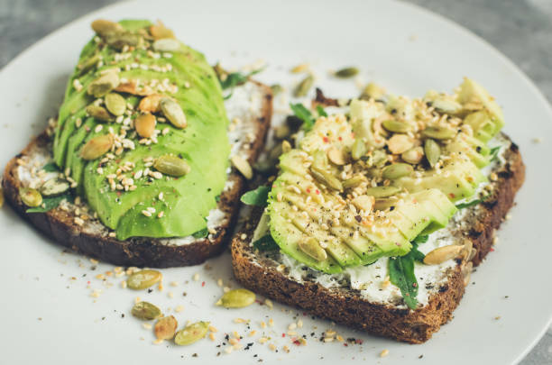 istock Healthy avocado toasts for breakfast or lunch with rye bread 1401664140