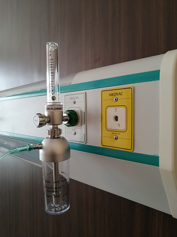 Oxygen flow-meter gauge with nozzle. A device for supplying oxygen to patients with respiratory problems installed in the wall in room at hospital