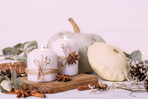 istock Autumn composition with pumpkin and candles. Beautiful autumn decor. 1401669012