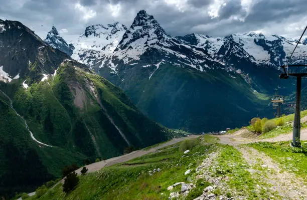 Photo of Cable car from the village of Dombay. View of the ridges of the Caucasus Mountains, Russia.