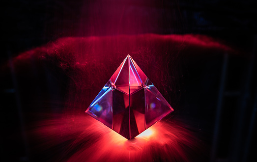 Light drawing of a crystal pyramid as a background