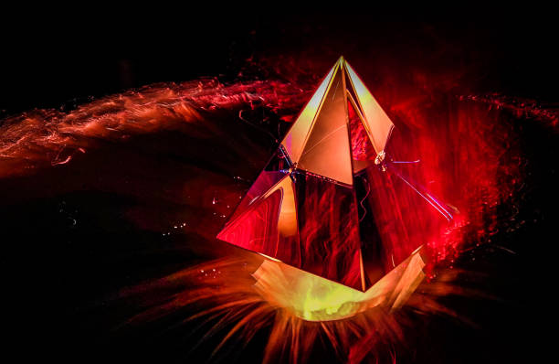 istock Light drawing of a crystal pyramid as a background 1401670240