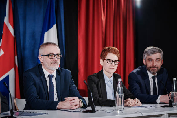 istock Representatives of countries sitting at conference 1401670524