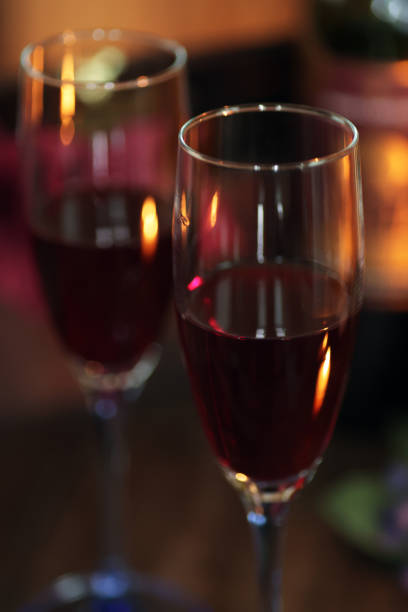 istock Evening drink with red wine poured into glasses in a calm atmosphere 1401671805