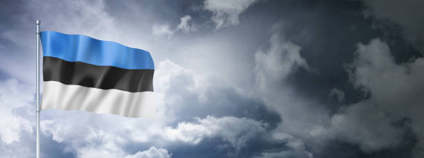 istock Estonian flag on a cloudy sky 1401672463