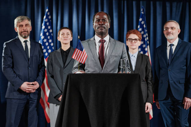 istock American leader with his group at conference 1401674313