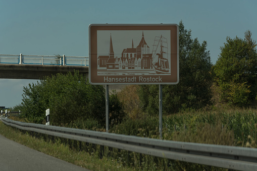 Autobahn sign in Germany Caption on German - city names  Rostock,