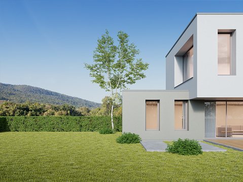 3d rendering of luxury modern house with lawn yard and mountain background.