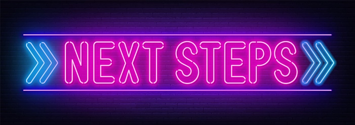 Next steps neon sign on brick wall background .