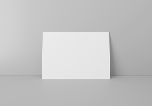 Empty white horizontal rectangle A4 paper sheet mockup on floor over grey wall, 3D rendering
