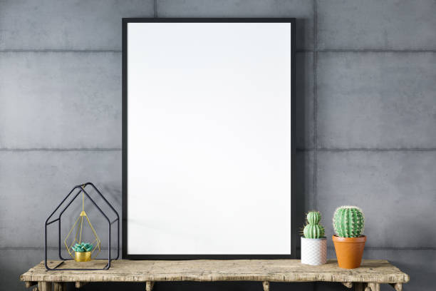 Blank empty picture frame mockup on gray cement wall. stock photo
