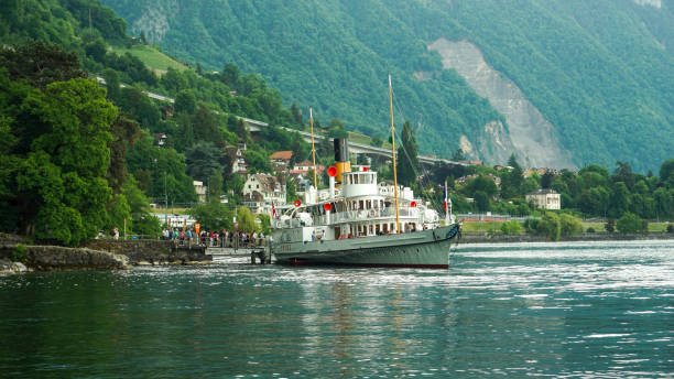 Boat cruise on Lake Geneva. Canton Vaud, Switzerland - 23 MAY 2022 : Boat cruise on Lake Geneva departed from dock near Chateau de Chillon in Veytaux. chateau de chillon photos stock pictures, royalty-free photos & images