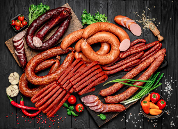istock Set of different types of smoked sausages. 1401693346