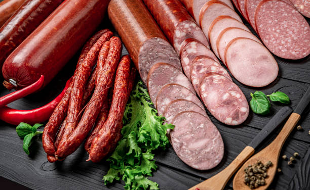 istock Set of different types of smoked sausage. 1401693361