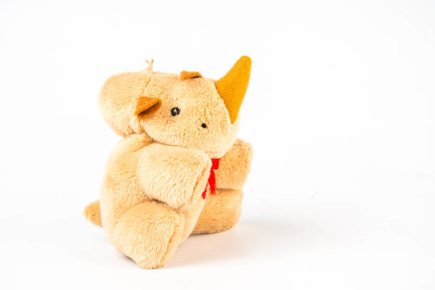 istock Rhinoceros doll on white background 1401695977