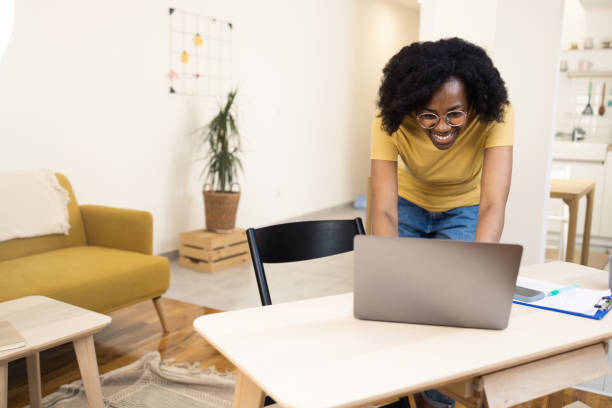 istock African American woman working at her home office 1401696311