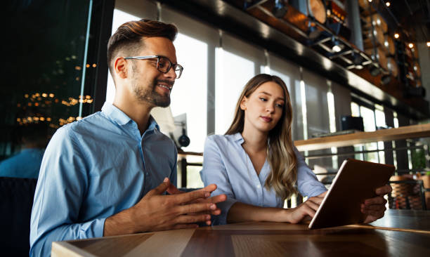 istock Business colleagues having conversation during coffee break 1401698409