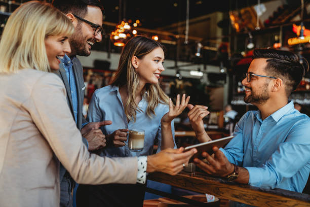 istock Business colleagues having conversation during coffee break 1401698559