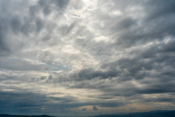 istock Beautiful clouds in sky over mountain valley 1401699244