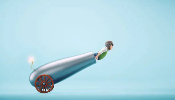 Man inside a cannon ready to launch. Start up and project launch concept. This is a 3d render illustration