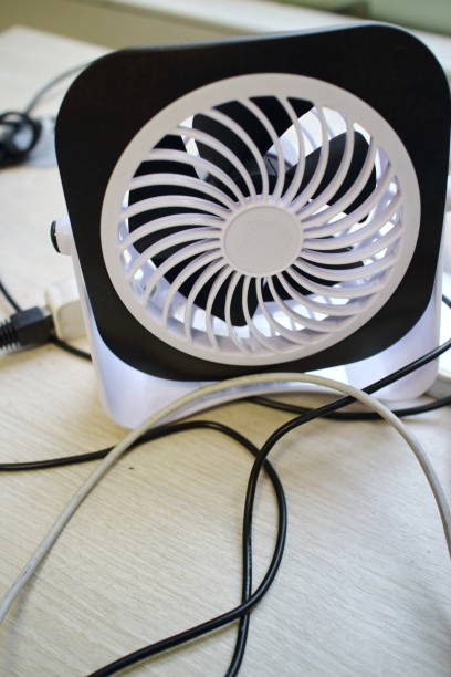 istock desk fan on office desk 1401703222