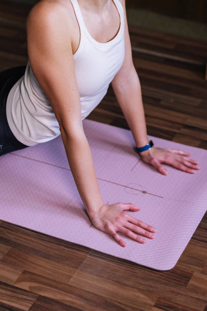 istock An Unrecognizable Beautiful Woman Doing Yoga 1401708726