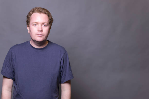 Man in his 30s wearing casual clothes.