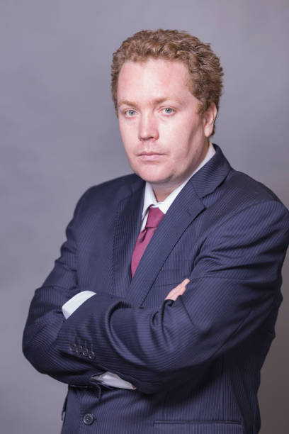 istock Man wearing a pinstriped suit 1401710333