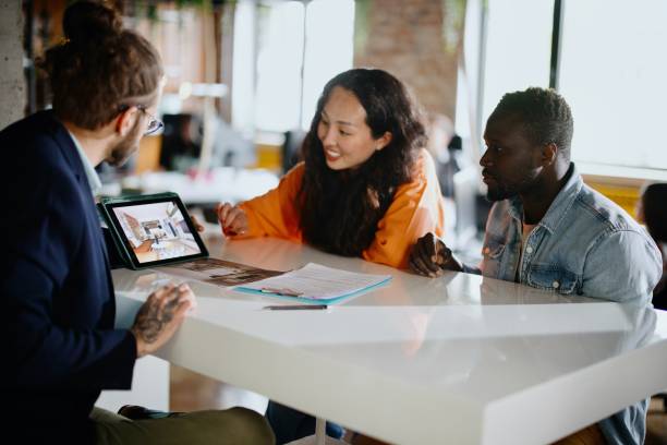 Client consultation: Real estate agent having a meeting with new customers