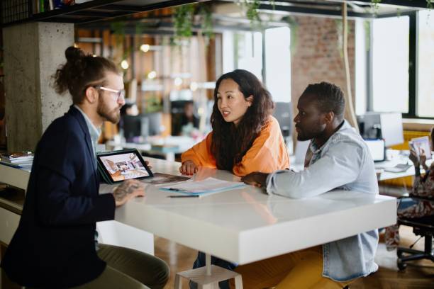 istock Client consultation: Real estate agent having a meeting with new customers 1401711678