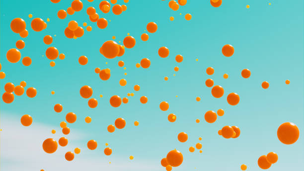 It is raining with orange balls that fall from a clear sky stock photo