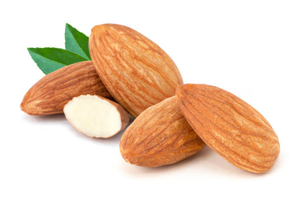 istock almond nuts and almond slice with green leaf 1401719902