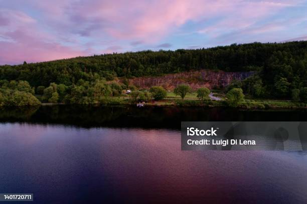 Carrickreagh Abandoned Quarry From Lough Erne With Rose Sunset Water Reflections Stock Photo - Download Image Now