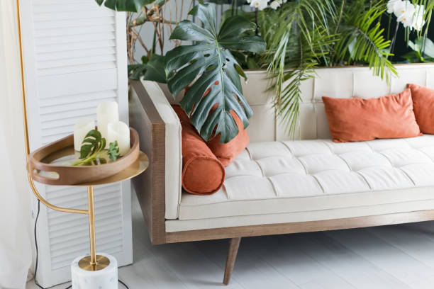 istock Living room with sofa tropic plants 1401722127