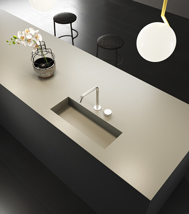 3d illustration\n\nAerial view of a kitchen sink. Design faucet in light color and ceramic floor in black. Decorating details such as stools and flower. lamp artificial light
