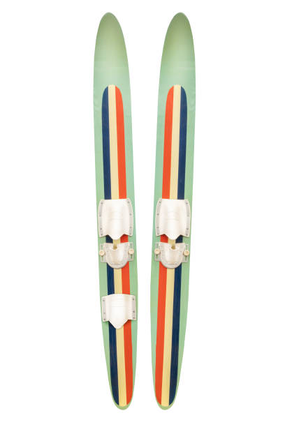 Two vintage weathered water skis isolated on a white background