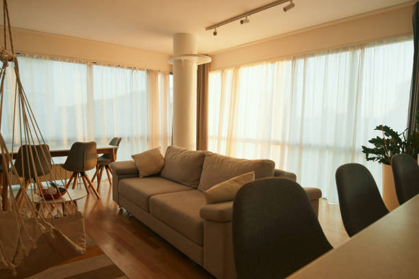istock Interior of a living room at sunset. 1401729084