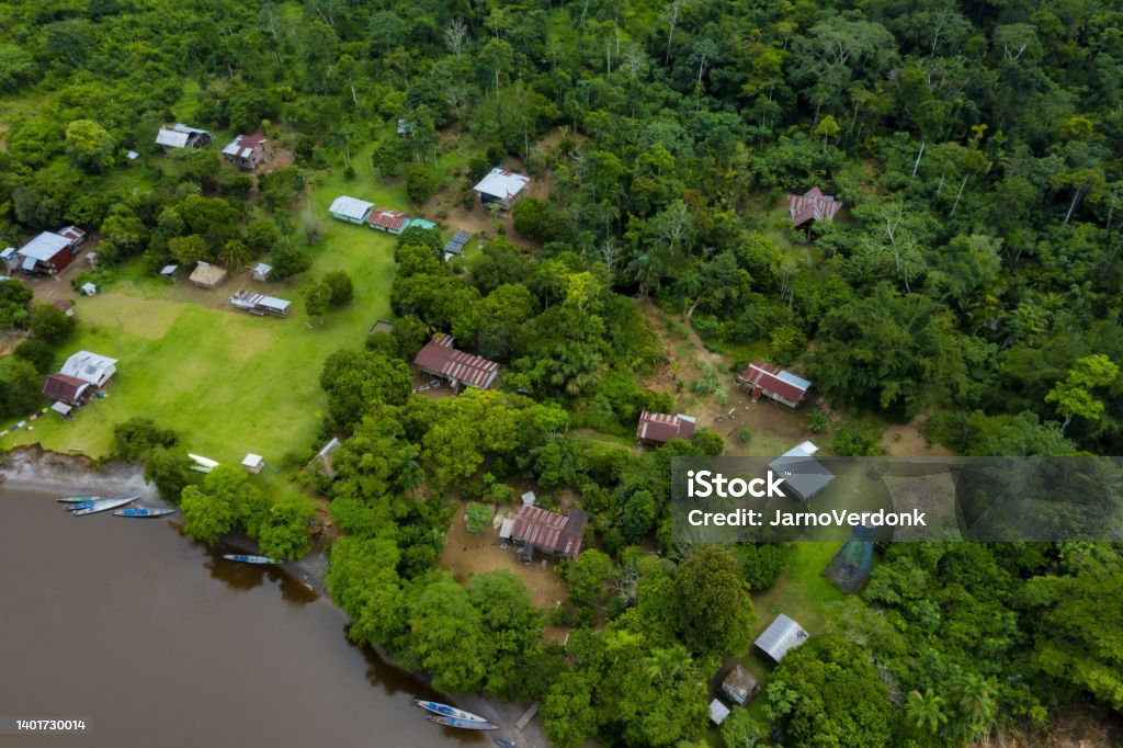 aerial top view of an indigenous community in the Amazon, the largest tropical forest aerial top view of an indigenous community in the Amazon Amazon Region Stock Photo