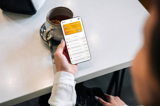 istock Mobile banking network. Smartphone with internet online bank application. Debit card wallet app. Save currency money wallet. 1401732743