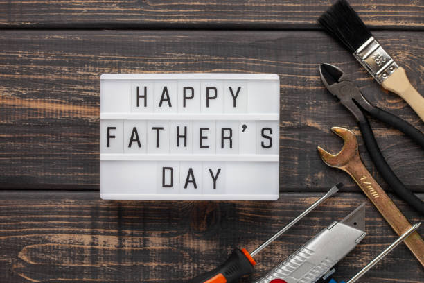 istock Work tools and equipment . Top view. Light box with text Happy Fathers Day 1401733137